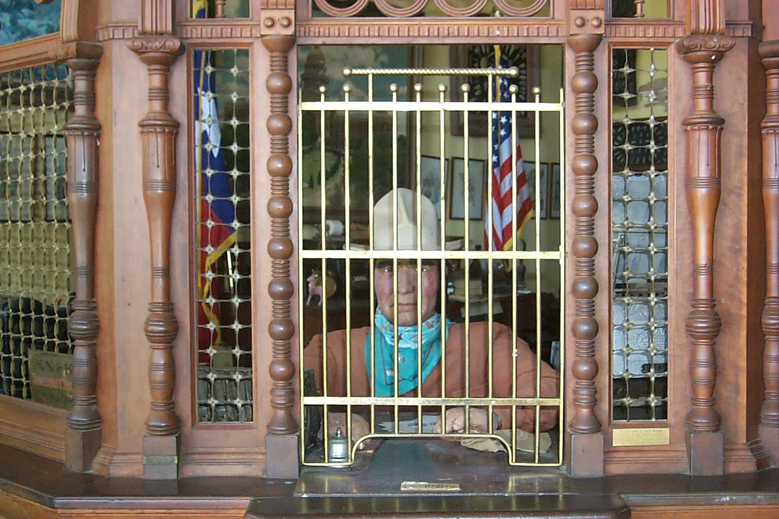 Here is another subsidary of the Judge's, the "Bean/Bottle/Boom State Bank. The bank takes care of the County Tresuary Funds, shown manning the teller window is the Judge's cousin "Woody."
